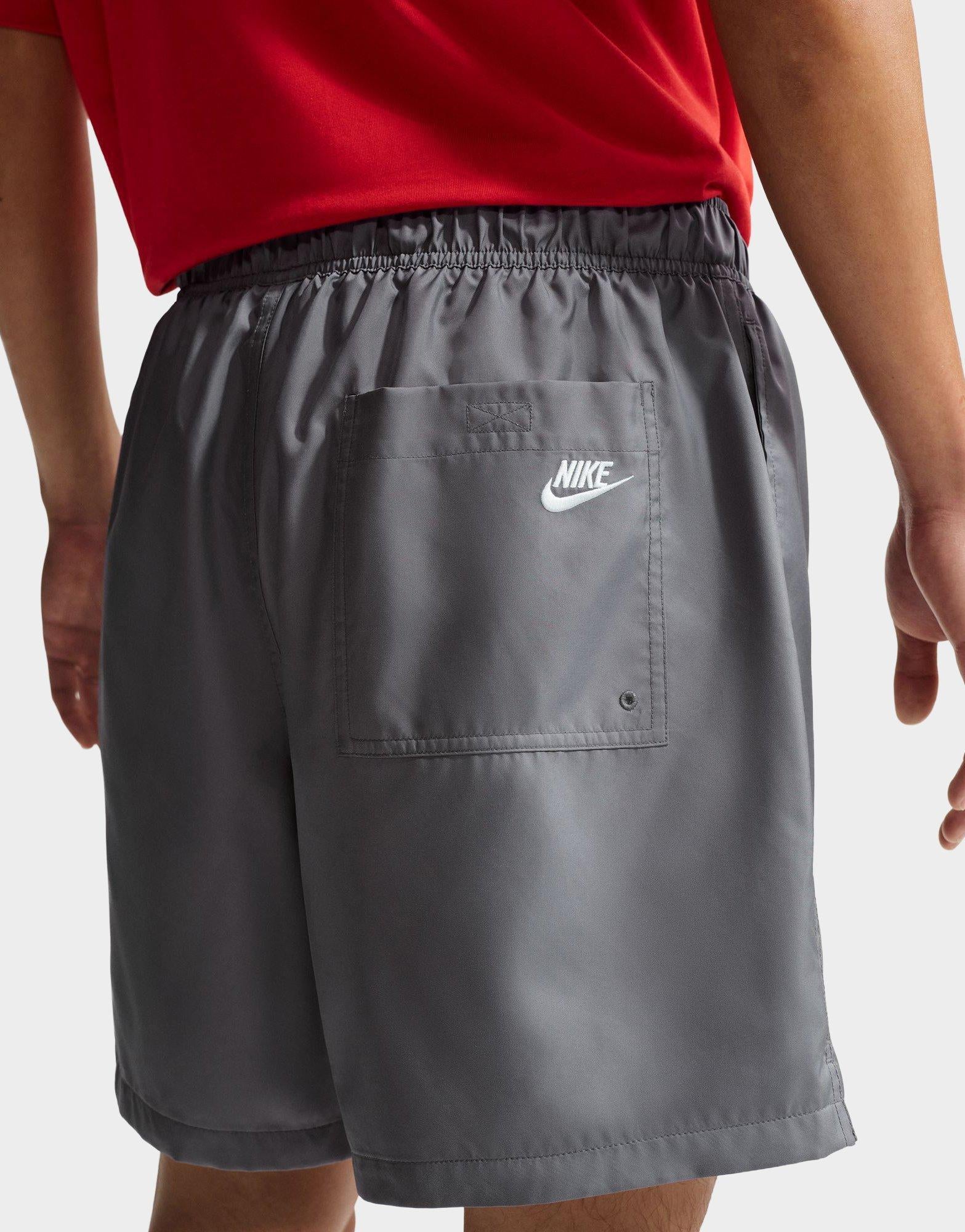 gray nike woven shorts