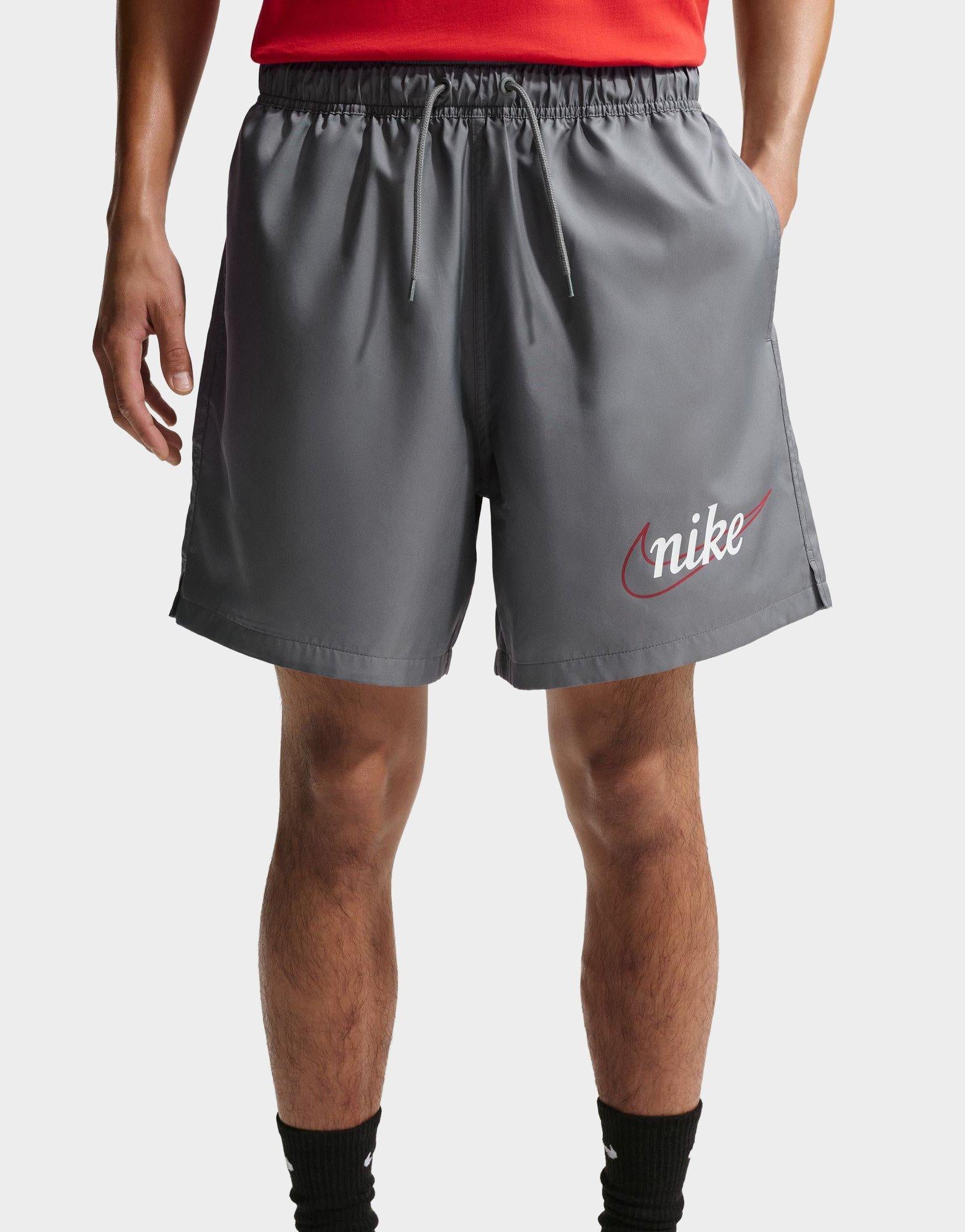 gray nike woven shorts